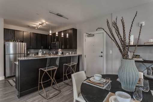 Modern Kitchen with Stainless Appliances at Flats on 4th Apartments in Birmingham, AL