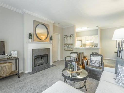 a living room with a fireplace and a couch
