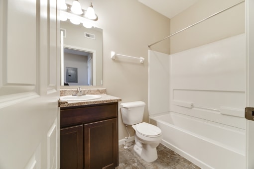 Ample Lighting Above Vanity At Austin Place Apartments