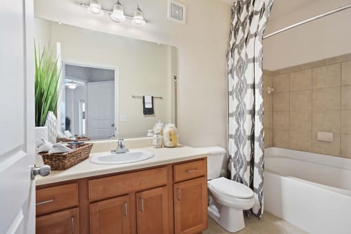 Large Soaking Tub In Primary Bathroom With A Tile Surround at Tapestry Park, Virginia, 23320