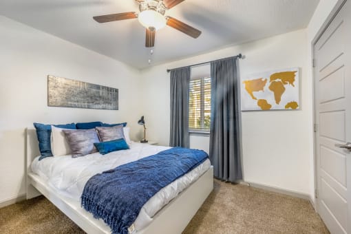 a bedroom with plush carpeting  at Retreat at Brightside Apartments in Baton Rouge, LA