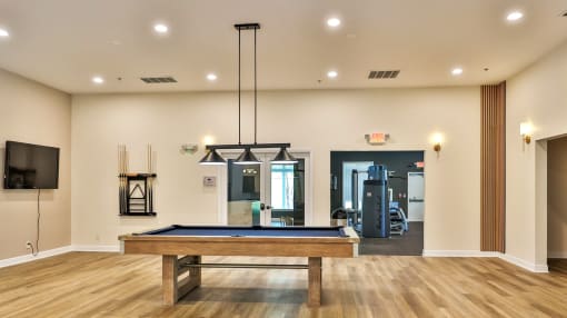 the preserve at ballantyne commons clubhouse with pool table and gym