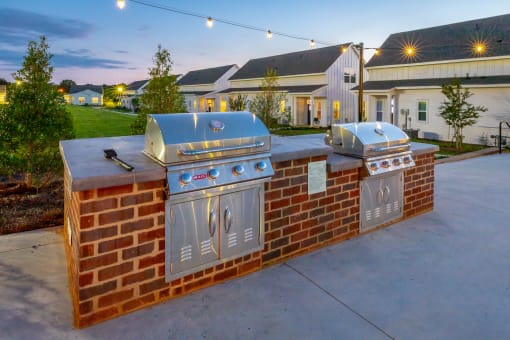 two stainless steel barbecue grills at Anthem Apartments and Cottages in Huntsville, Alabama