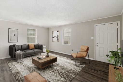 renovated apartment homes  Living Room with wood flooring at Midtown Oaks Townhomes in Mobile, AL