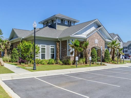 a house with a parking lot in front of it