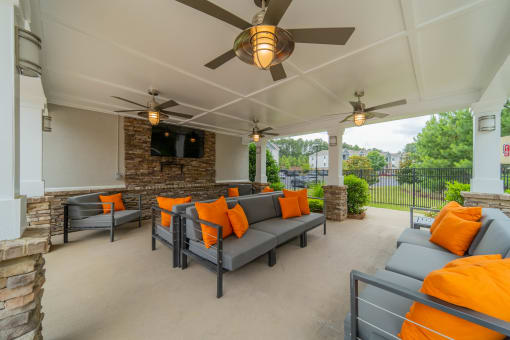 the preserve at ballantyne commons covered patio with couches