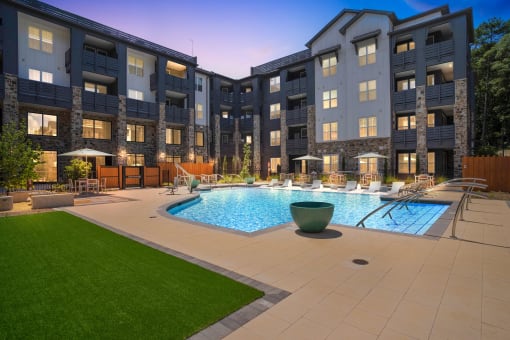 twilight view of the pool at Tapestry Overbrook in McDonough, Georgia