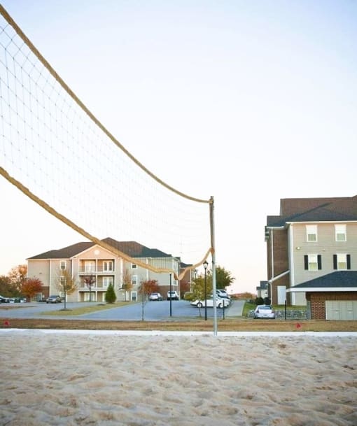 a volleyball net in the middle of a street