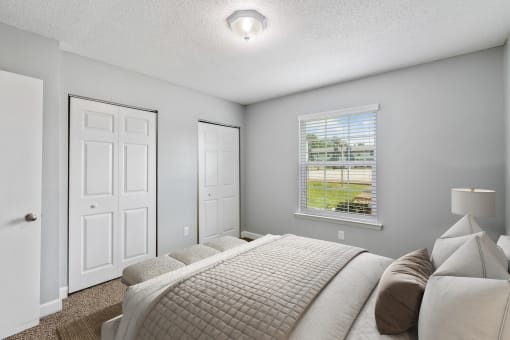 Bedroom with natural light  at Mirabelle Apartments in Mobile, Alabama