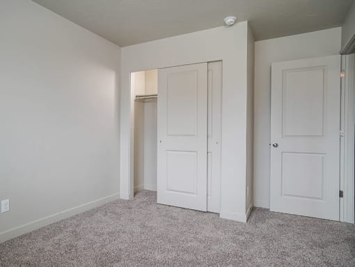 Room with carpeted floor at The Village at Church & Main, Layton