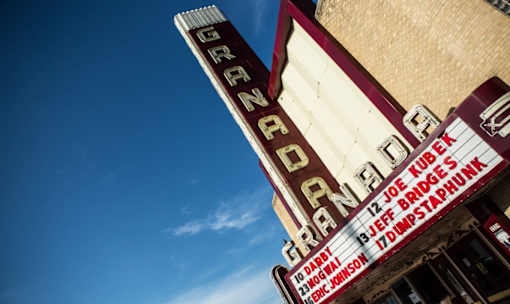 Historic granada theater marquee with vertical signage at Matilda at Lower Greenville Apartments, Texas, 75206