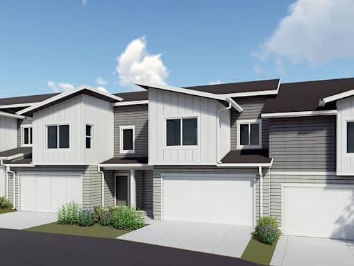 A modern two-story house with a garage is shown in the image.