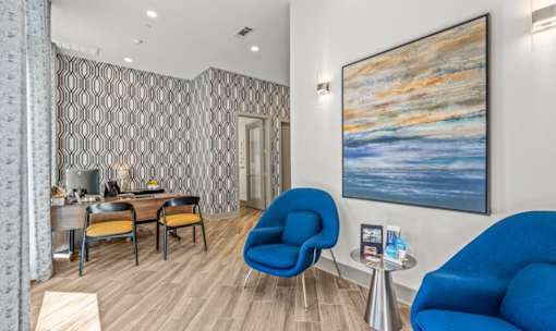 Office reception area with patterned accent wall at Avion at West Lemmon Apartments, Texas, 75235