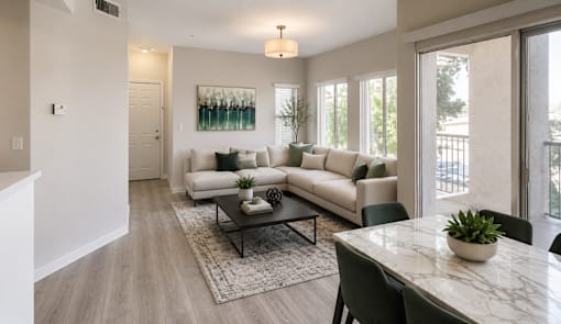 Open concept living and dining area with balcony at Cortina Apartments, Phoenix, 85022
