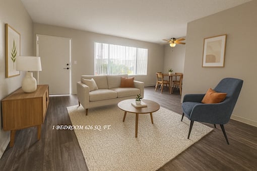 A living room with a couch, chair, and coffee table.