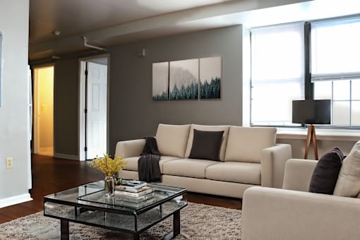 a living room with a couch and a coffee table