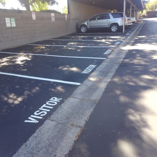 the side of a black wall with a car parked next to it at Cowell Terrace Apartments, California, 94518
