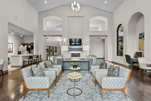 A living room with a grey sofa and a coffee table.