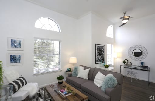 a living room with a couch and a coffee table