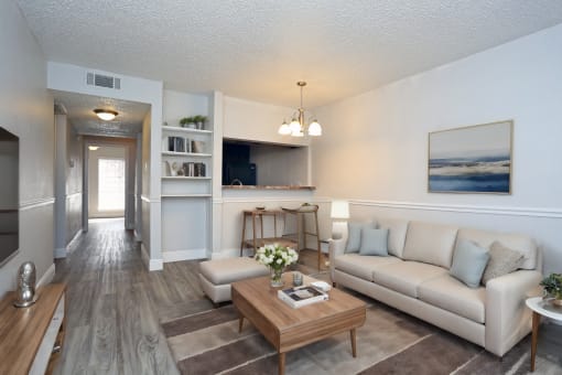 a living room with a couch and a coffee table
