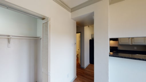 a view of the kitchen and living room from the dining room