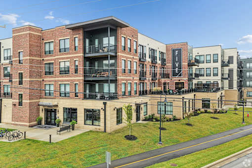 Apartment complex with the name Five on the side.