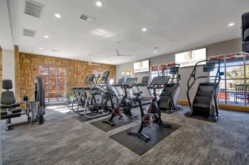 Fitness center with cardio equipment, Peloton Bikes, and Strength Training Equipment
