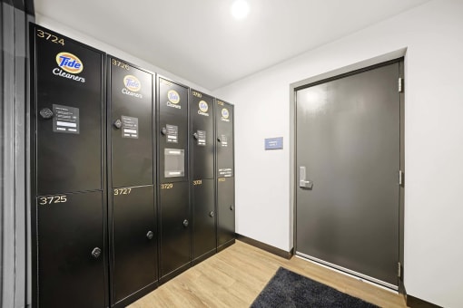 a set of stainless steel lockers in a room with
