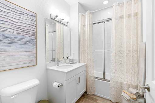 a bathroom with a sink and a shower