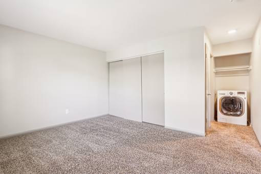 A laundry room with a washer and dryer.