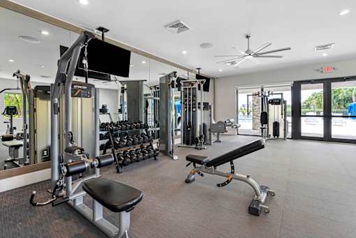 the gym at the flats at big tex apartments