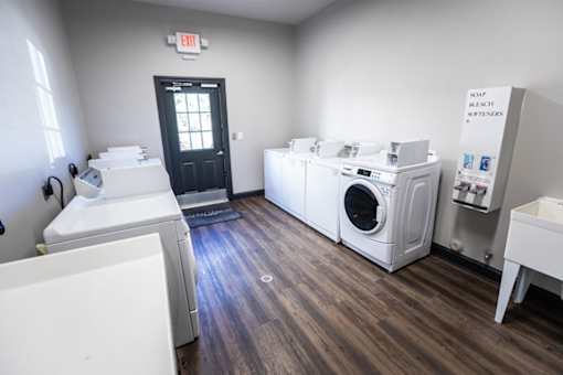 A laundry room with a washer and dryer.