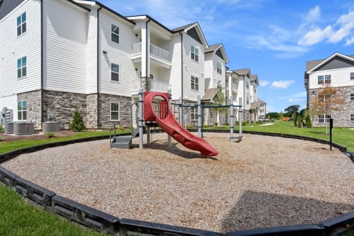 the preserve at ballantyne commons playground with a red slide