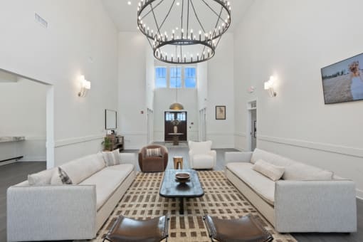 a living room with couches and a coffee table