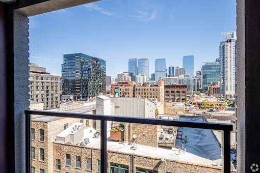 A cityscape viewed from a high-rise building.
