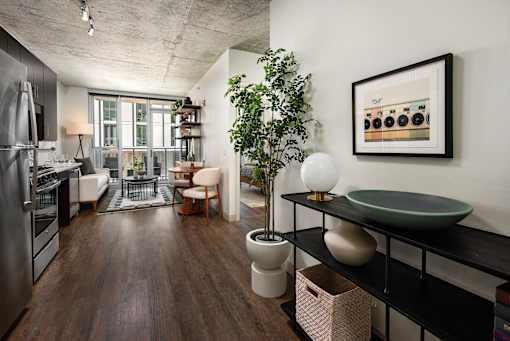 A modern kitchen with a view of the city.