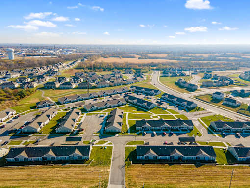 A suburban neighborhood with houses and roads.