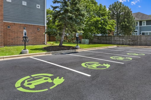 a parking lot with symbols of bikes on the ground