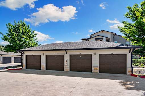 A two-story building with a garage door on each floor.