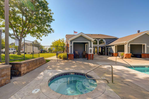 our apartments have a pool and a patio with a house