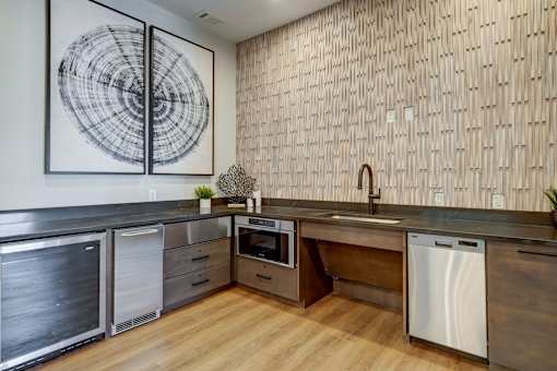 a kitchen with a sink and a dishwasher
