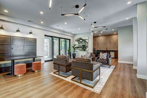 a living room with couches and a tv