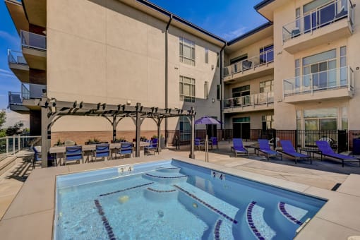 our apartments have a large pool and lounge chairs