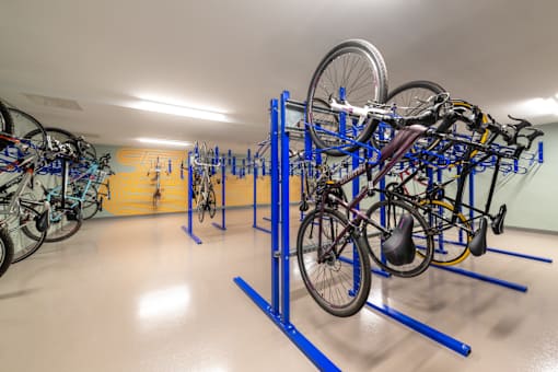 A bike rack with many bikes on it.