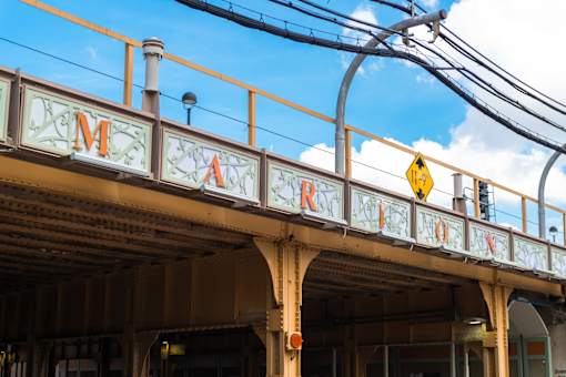 A train station with a sign that reads