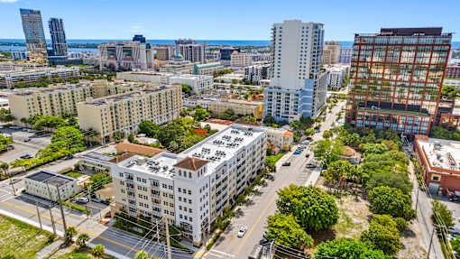 A cityscape with a mix of residential and commercial buildings.