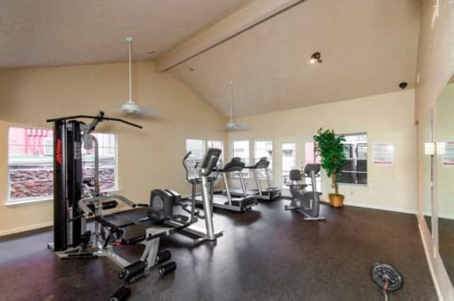 24 Hour Fitness Center with Cardio Machines and Weight Machines