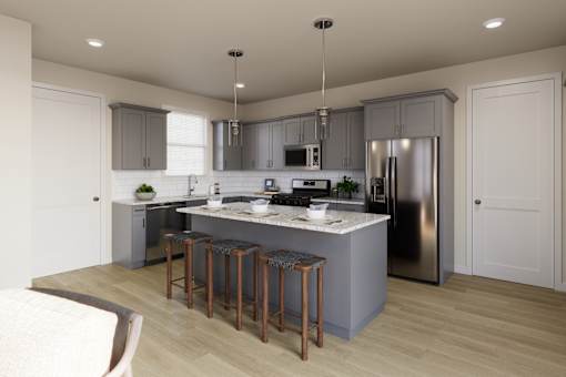 A kitchen with wooden cabinets and a stainless steel refrigerator.