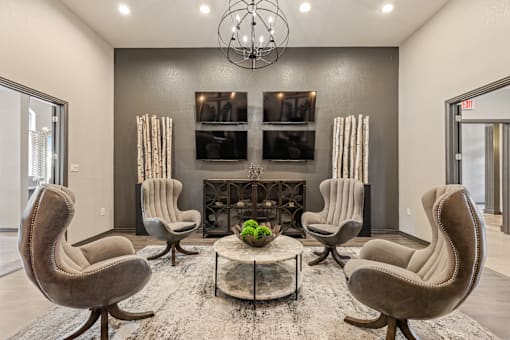 A living room with a grey sofa and a coffee table.