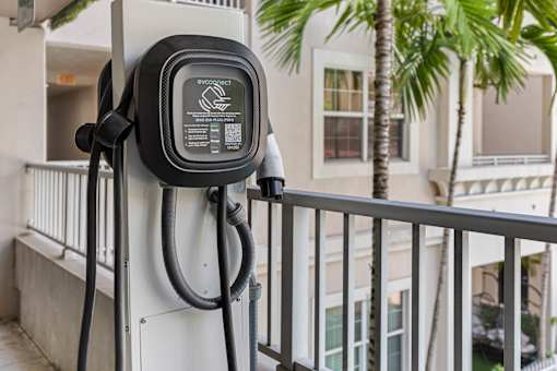 A charging station for electric vehicles is installed on a balcony.